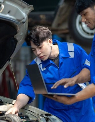 Quality Inspectors checking a car