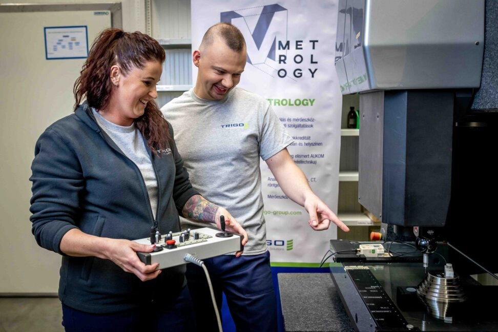 TRIGO quality expert and engineer using a metrology machine