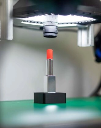 Scortex Spark our optical inspection device, inspecting a lipstick